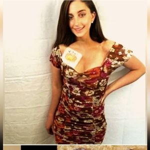 '60s bodycon ruched with a cap sleeve